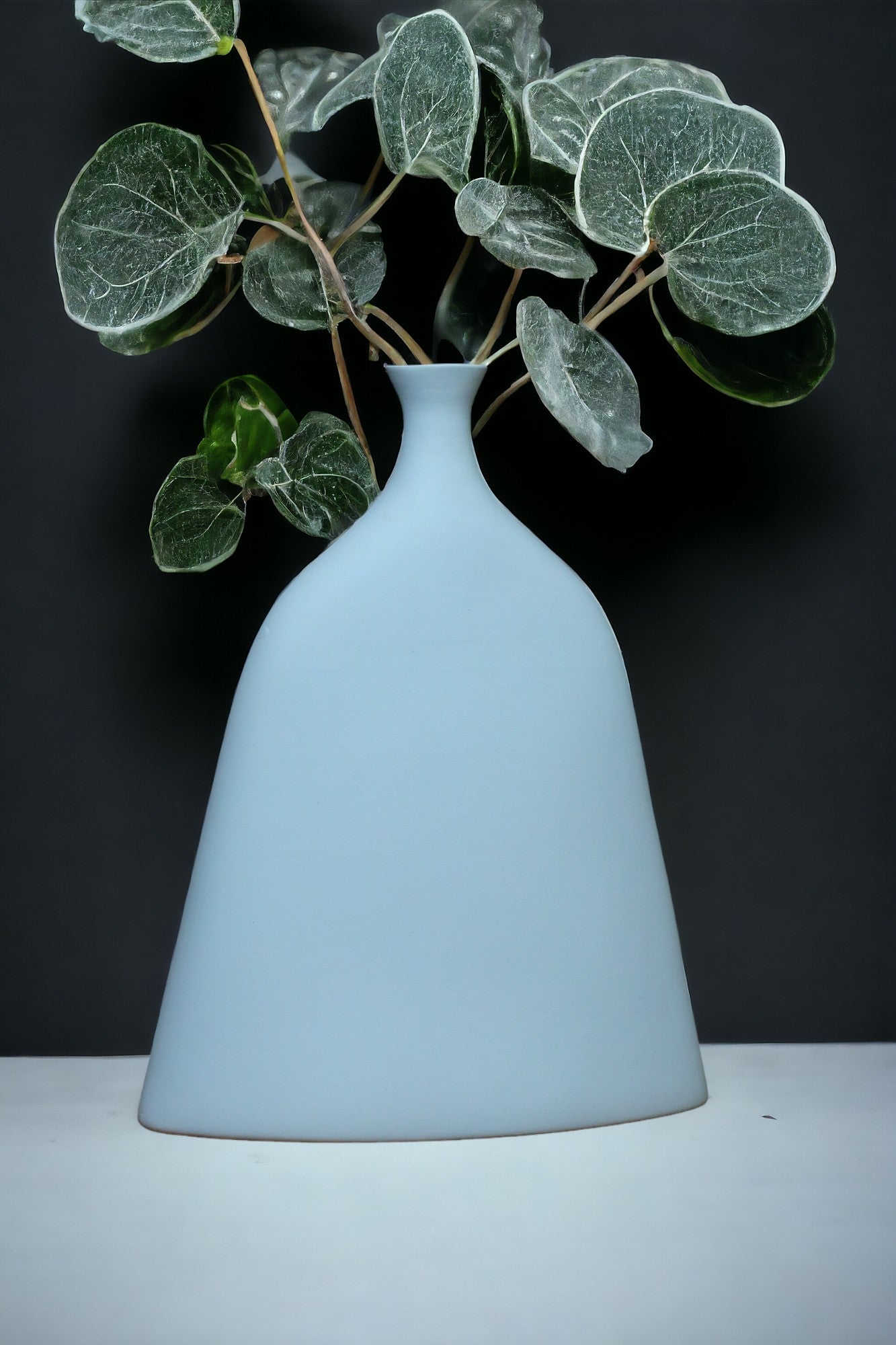 Unique shaped blue vase