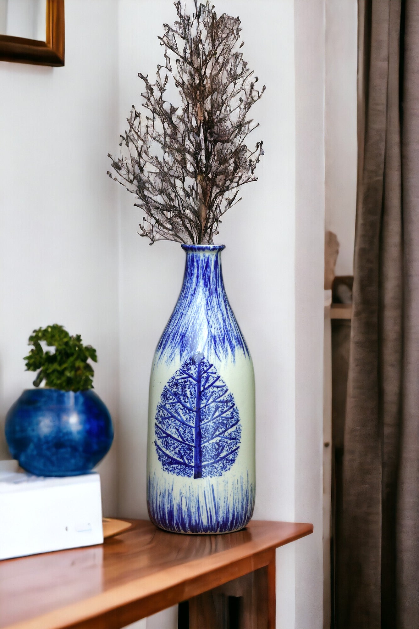 white and blue peepal vase