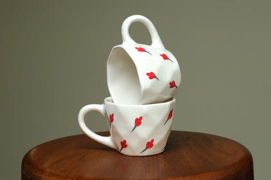 Pentagon shaped coaster with floral cups