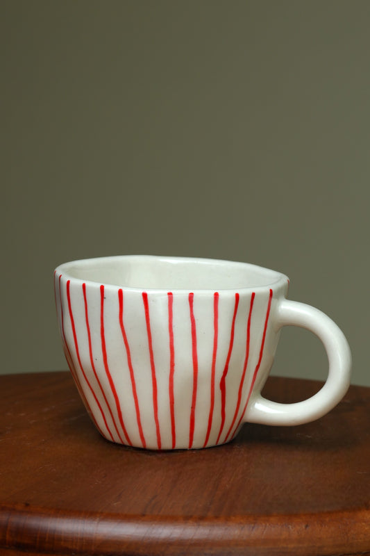 Artistic White Cups with Vertical Red Lines