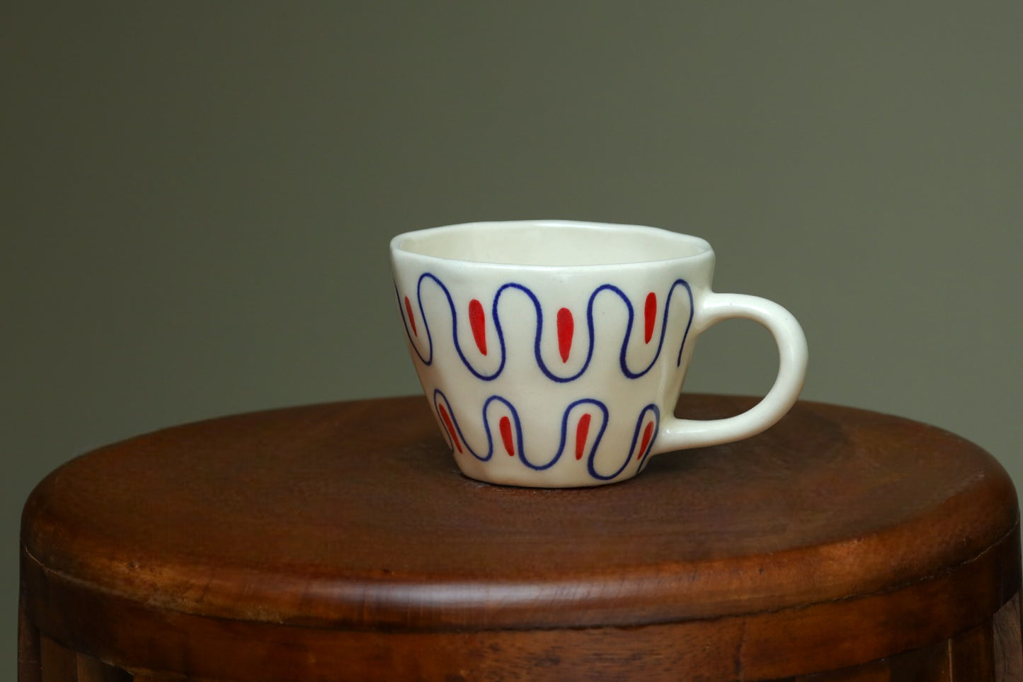 Exclusive white cups with blue and red art