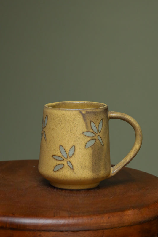 Antique brown mugs with flowers